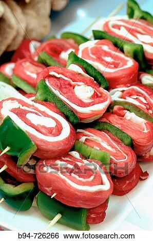 Stock Photograph - Stuffed meat at La Boqueria market, Barcelona. Catalonia, Spain. Fotosearch