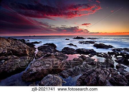 Stunning sunset over pacific ocean, Garrapata, california. View Large Photo Image Stock Image - Stunning sunset over pacific ocean, Garrapata, california.. Fotosearch