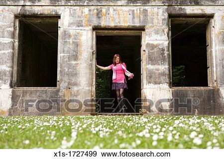 Stock Photo - Stylish, elegant American woman outdoors. Fotosearch