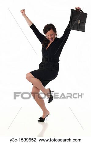 Successful businesswoman - Business woman with briefcase celebrating success View Large Photo Image Stock Image - Successful businesswoman - Business woman with briefcase celebrating success. Fotosearch