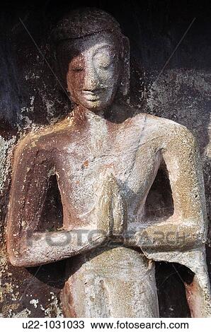 Stock Image - Sukhothai (Thailand): bas-relief at the Wat Mahathat. Fotosearch