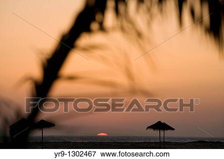 Summer sunset at Tarifa Beach, Spain View Large Photo Image Stock Photo - Summer sunset at Tarifa Beach, Spain. Fotosearch