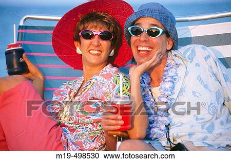summer tourists at the beach View Large Photo Image Stock Image - summer tourists at the beach. Fotosearch