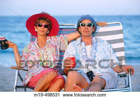 summer tourists at the beach View Large Photo Image Stock Image - summer tourists at the beach. Fotosearch