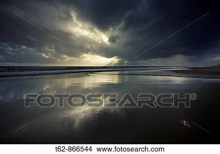 Sun putting in winter Beach of the Costa Dorada, Catalonia, Spain Mediterranea Sea View Large Photo Image Picture - Sun putting in winter Beach of the Costa Dorada, Catalonia, Spain Mediterranea Sea. Fotosearch