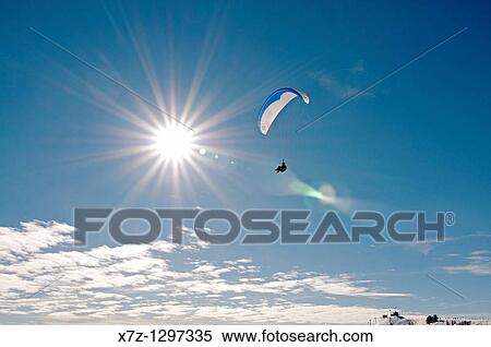 Sun Valley, paragliding over Bald Mountain at Sun Valley Resort near the cities of Ketchum and Sun Valley in central Idaho View Large Photo Image Stock Photography - Sun Valley, paragliding over Bald Mountain at Sun Valley Resort near the cities of Ketchum and Sun Valley in central Idaho. Fotosearch