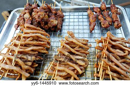 sundried beef and pork on stick, bbq and ready to eat, fast food bangkok style, food and travel, thailand View Large Photo Image Stock Image - sundried beef and pork on stick, bbq and ready to eat, fast food bangkok style, food and travel, thailand. Fotosearch