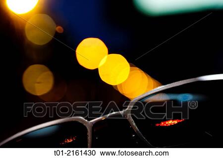sunglasses with city lights background. View Large Photo Image Stock Image - sunglasses with city lights background.. Fotosearch