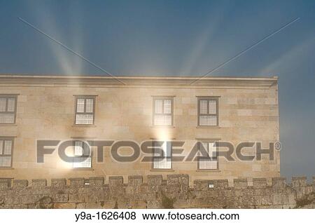Sunrays reflected in the Parador Nacional, Baiona, Pontevedra, Galicia, Spain View Large Photo Image Stock Photo - Sunrays reflected in the Parador Nacional, Baiona, Pontevedra, Galicia, Spain. Fotosearch
