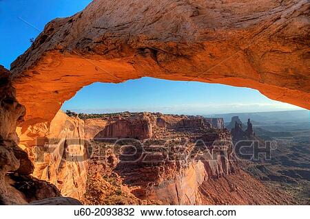 Sunrise at Mesa Arch at Canyonlands National Park, Utah. View Large Photo Image Stock Image - Sunrise at Mesa Arch at Canyonlands National Park, Utah.. Fotosearch