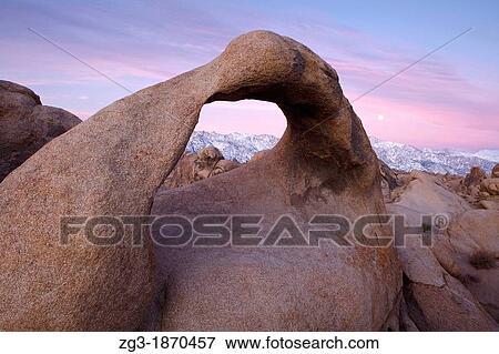 Sunrise at Mobius Arch in the Alabama Hills with the Sierras in the background Alabama Hills, Lone Pine, California, USA View Large Photo Image Stock Photo - Sunrise at Mobius Arch in the Alabama Hills with the Sierras in the background Alabama Hills, Lone Pine, California, USA. Fotosearch