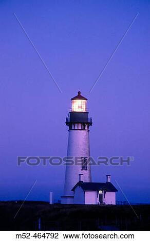 Stock Image - Sunrise at Yaquina Head lighthouse. Oregon, USA. Fotosearch