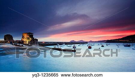 Sunrise, Bay of Castro Urdiales, Cantabria, Northern Spain View Large Photo Image Stock Photography - Sunrise, Bay of Castro Urdiales, Cantabria, Northern Spain. Fotosearch
