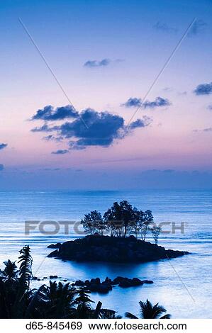Sunrise, Fairyland Beach, Mahe island, Seychelles View Large Photo Image Stock Photo - Sunrise, Fairyland Beach, Mahe island, Seychelles. Fotosearch