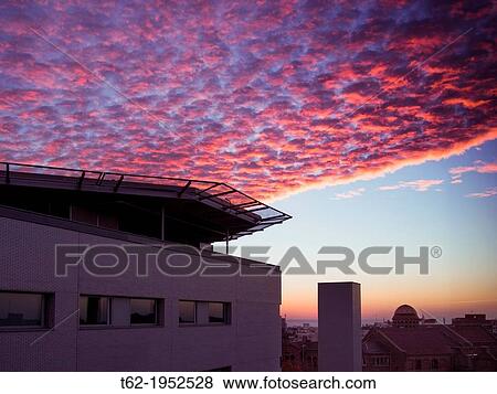 Stock Photo - Sunrise from the hospital window. Red Sky.. Fotosearch