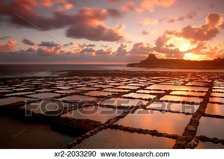 Sunrise in Salt Pans, Gozo island, Malta. View Large Photo Image Stock Image - Sunrise in Salt Pans, Gozo island, Malta.. Fotosearch