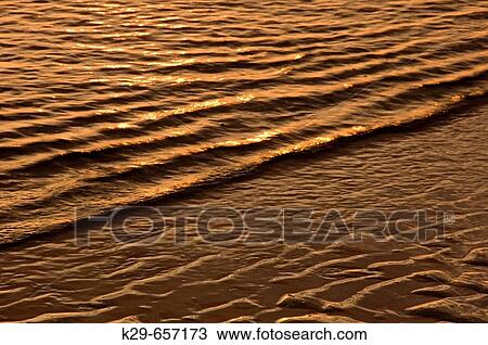 Sunrise light reflected on light surf along Cabot Beach. Cabot Beach Provincial Park, PEI, Canada View Large Photo Image Stock Image - Sunrise light reflected on light surf along Cabot Beach. Cabot Beach Provincial Park, PEI, Canada. Fotosearch