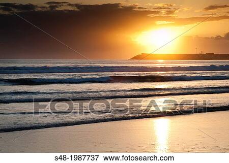 Sunrise on the beach of Laredo. Cantabria. Spain. Europe. View Large Photo Image Stock Photo - Sunrise on the beach of Laredo. Cantabria. Spain. Europe.. Fotosearch