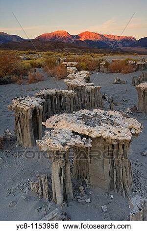 Sunrise over Mono Lake tufas with Sierra mountians in the background View Large Photo Image Stock Photograph - Sunrise over Mono Lake tufas with Sierra mountians in the background. Fotosearch