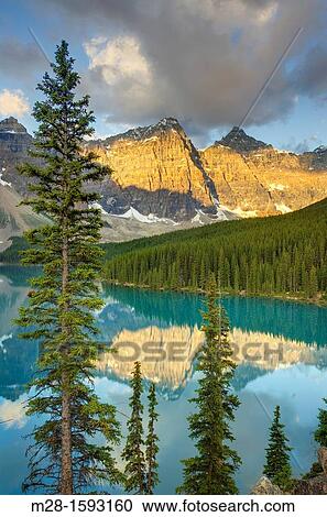 Sunrise over Moraine Lake and Wenkchemna Peaks, Banff National Park Alberta Canada View Large Photo Image Stock Image - Sunrise over Moraine Lake and Wenkchemna Peaks, Banff National Park Alberta Canada. Fotosearch