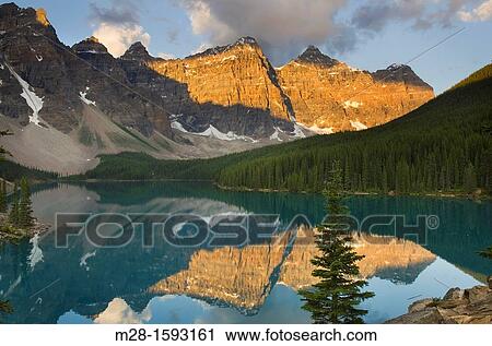 Sunrise over Moraine Lake and Wenkchemna Peaks, Banff National Park Alberta Canada View Large Photo Image Stock Image - Sunrise over Moraine Lake and Wenkchemna Peaks, Banff National Park Alberta Canada. Fotosearch