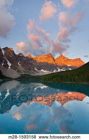 Sunrise over Moraine Lake and Wenkchemna Peaks, Banff National Park Alberta Canada View Large Photo Image Stock Photo - Sunrise over Moraine Lake and Wenkchemna Peaks, Banff National Park Alberta Canada. Fotosearch