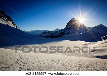Sunrise over Pic du Midi d'Ossau in winter. Pyrenees National Park. Aquitaine. France. View Large Photo Image Stock Photo - Sunrise over Pic du Midi d'Ossau in winter. Pyrenees National Park. Aquitaine. France.. Fotosearch