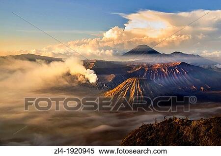 Sunrise over the volcanoes (from mount Penanjakan). Indonesia, Java, Jawa Timur, Bromo-Tengger-Semeru National Park. (/Julien Garcia) View Large Photo Image Stock Photography - Sunrise over the volcanoes (from mount Penanjakan). Indonesia, Java, Jawa Timur, Bromo-Tengger-Semeru National Park. (/Julien Garcia). Fotosearch