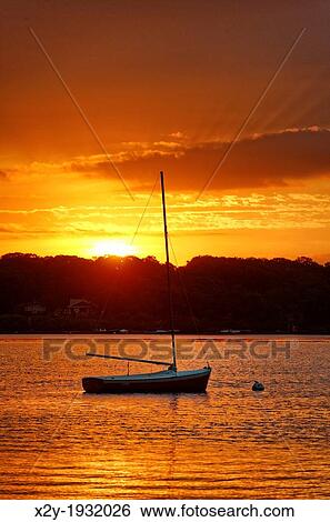 Sunrise sailboat, the Lagoon, West Tisbury, Martha's Vineyard, Massachusetts, USA View Large Photo Image Stock Photograph - Sunrise sailboat, the Lagoon, West Tisbury, Martha's Vineyard, Massachusetts, USA. Fotosearch