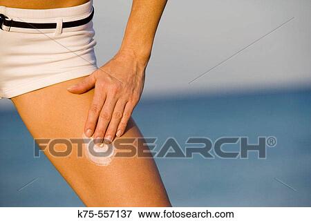 Sunscreen, lotion, beach, caucasian-hispanic, age 30 to 40. View Large Photo Image Stock Photo - Sunscreen, lotion, beach, caucasian-hispanic, age 30 to 40.. Fotosearch