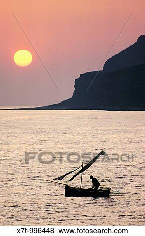 Sunset across Itylo bay from Limeni in the Messinian Gulf, the Mani, Southern Peloponnese, Greece View Large Photo Image Stock Photo - Sunset across Itylo bay from Limeni in the Messinian Gulf, the Mani, Southern Peloponnese, Greece. Fotosearch
