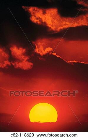 Sunset and clouds. Masai Mara, Kenya View Large Photo Image Stock Photo - Sunset and clouds. Masai Mara, Kenya. Fotosearch