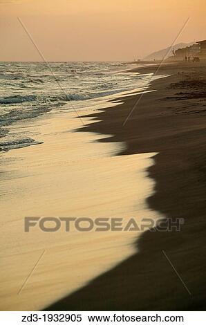 Stock Photography - Sunset at beach, Castelldefels, Barcelona, Spain. Fotosearch