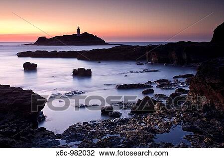 Sunset at Godrevy Cornwall England UK View Large Photo Image Stock Image - Sunset at Godrevy Cornwall England UK. Fotosearch
