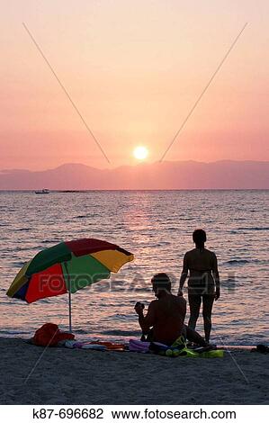 Sunset at Kalogeras beach, Elafonissos island, Greece. View Large Photo Image Stock Image - Sunset at Kalogeras beach, Elafonissos island, Greece.. Fotosearch
