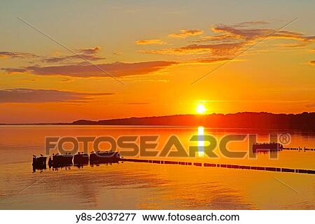 Sunset at Kamminke, Usedom Island, Germany. View Large Photo Image Stock Photo - Sunset at Kamminke, Usedom Island, Germany.. Fotosearch