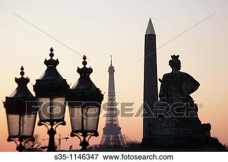 Stock Photo - Sunset at Place de la Concorde with Eiffel Tower in the background, Paris,? le-de-France, France. Fotosearch