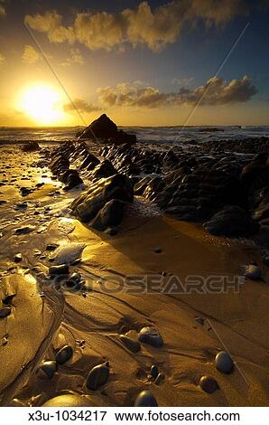 Sunset at Sandymouth in North Cornwall, England View Large Photo Image Stock Photo - Sunset at Sandymouth in North Cornwall, England. Fotosearch