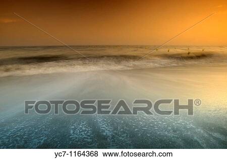 sunset at the beach in malaga, spain View Large Photo Image Stock Photo - sunset at the beach in malaga, spain. Fotosearch