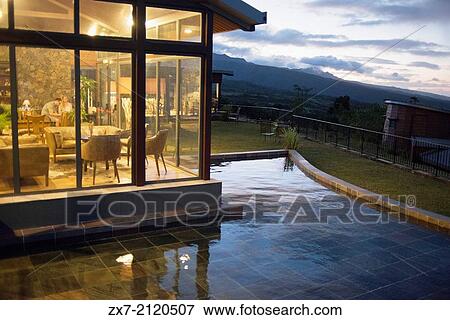 Sunset at the Hotel Diana Dea Lodge. Located in a park of 150 acres on the island of La Reunion, Diana Dea Lodge is 9 Km from Sainte-Anne. View Large Photo Image Stock Photo - Sunset at the Hotel Diana Dea Lodge. Located in a park of 150 acres on the island of La Reunion, Diana Dea Lodge is 9 Km from Sainte-Anne.. Fotosearch