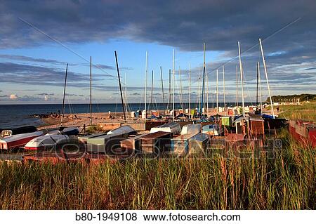 Sunset, boat harbour, beach, beach chairs, Surendorf, the Baltic Sea, Schleswig-Holstein, Germany, Europe. View Large Photo Image Stock Photo - Sunset, boat harbour, beach, beach chairs, Surendorf, the Baltic Sea, Schleswig-Holstein, Germany, Europe.. Fotosearch