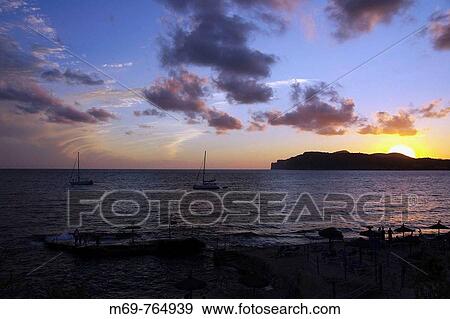 Sunset, Costa de la Calma, Majorca. Balearic Islands, Spain View Large Photo Image Stock Photo - Sunset, Costa de la Calma, Majorca. Balearic Islands, Spain. Fotosearch