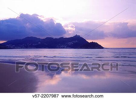 Sunset from La Concha beach. San Sebastian, Guipuzcoa province, Basque Country, Spain. View Large Photo Image Stock Photo - Sunset from La Concha beach. San Sebastian, Guipuzcoa province, Basque Country, Spain.. Fotosearch