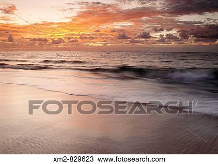 Sunset from Maspalomas on Gran Canaria in the Canary islands, Spain. View Large Photo Image Stock Image - Sunset from Maspalomas on Gran Canaria in the Canary islands, Spain.. Fotosearch