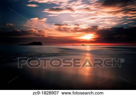Sunset in Cala Comte beach Ibiza, Balearic Islands, Spain View Large Photo Image Stock Photo - Sunset in Cala Comte beach Ibiza, Balearic Islands, Spain. Fotosearch