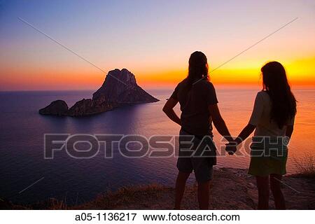 Sunset in es Vedra. Sant Josep de sa Talaia. Ibiza. Balearic Islands. Spain. View Large Photo Image Stock Photo - Sunset in es Vedra. Sant Josep de sa Talaia. Ibiza. Balearic Islands. Spain.. Fotosearch