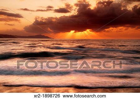 Sunset in Itzurun beach, Zumaia, Basque Country, Spain. View Large Photo Image Stock Photograph - Sunset in Itzurun beach, Zumaia, Basque Country, Spain.. Fotosearch