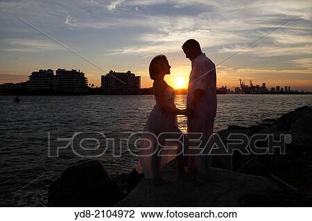 Sunset in Miami Beach, Florida, USA View Large Photo Image Stock Image - Sunset in Miami Beach, Florida, USA. Fotosearch
