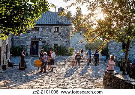 Sunset in the village of Cebreiro while a group plays the bagpipes. View Large Photo Image Stock Photograph - Sunset in the village of Cebreiro while a group plays the bagpipes.. Fotosearch