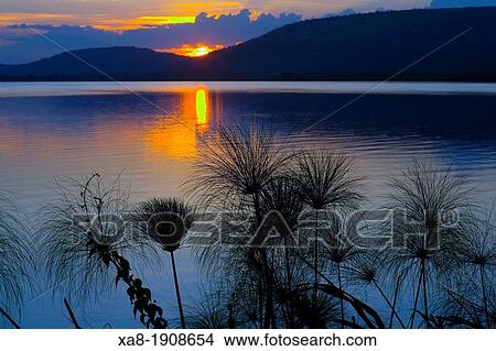 SUNSET LAKE NATIONAL PARK Mburu, UGANDA. View Large Photo Image Picture - SUNSET LAKE NATIONAL PARK Mburu, UGANDA.. Fotosearch